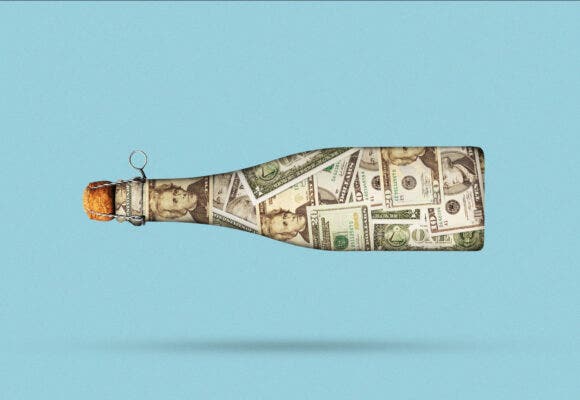 A Bottle of Cider made out of dollar bills on a blue background