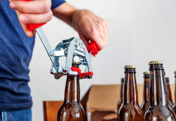 close up on sealing home-brewed beer