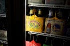 Anchor beer displayed in a fridge at a grocery store